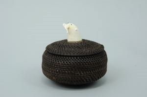 Image: baleen basket with otter and fish finial